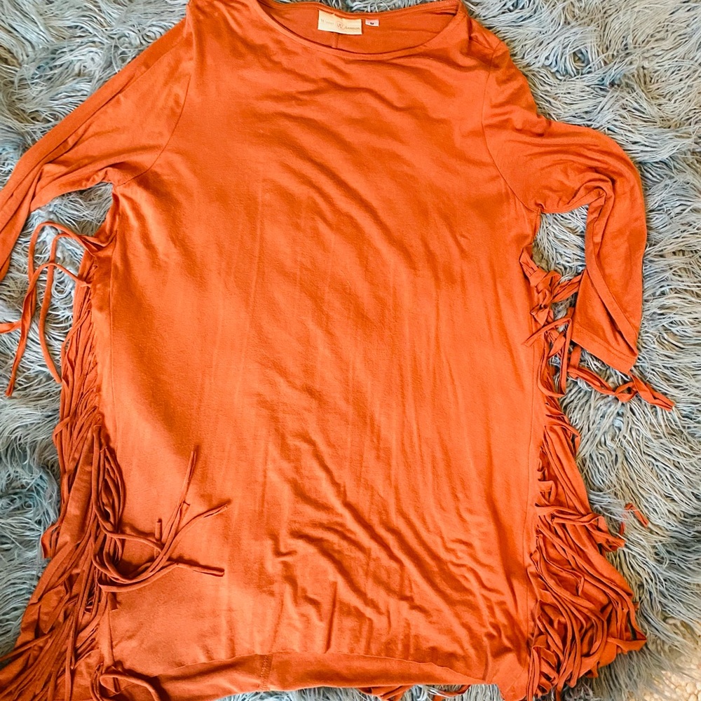 Tunic with fringe detail. Purchased at boutique.